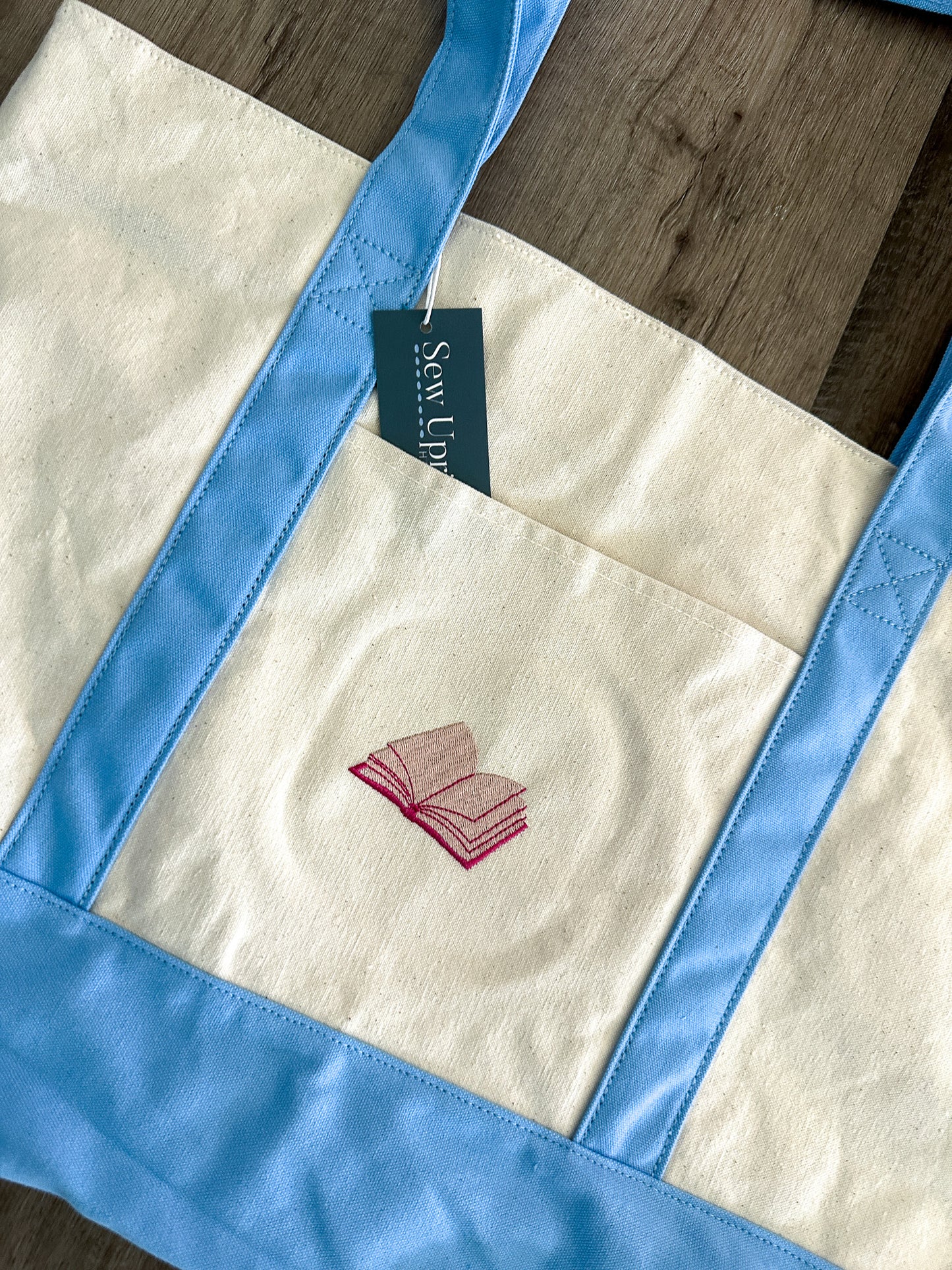 MEET ME AT THE BOOKSHOP EMBROIDERED BOOK TOTE