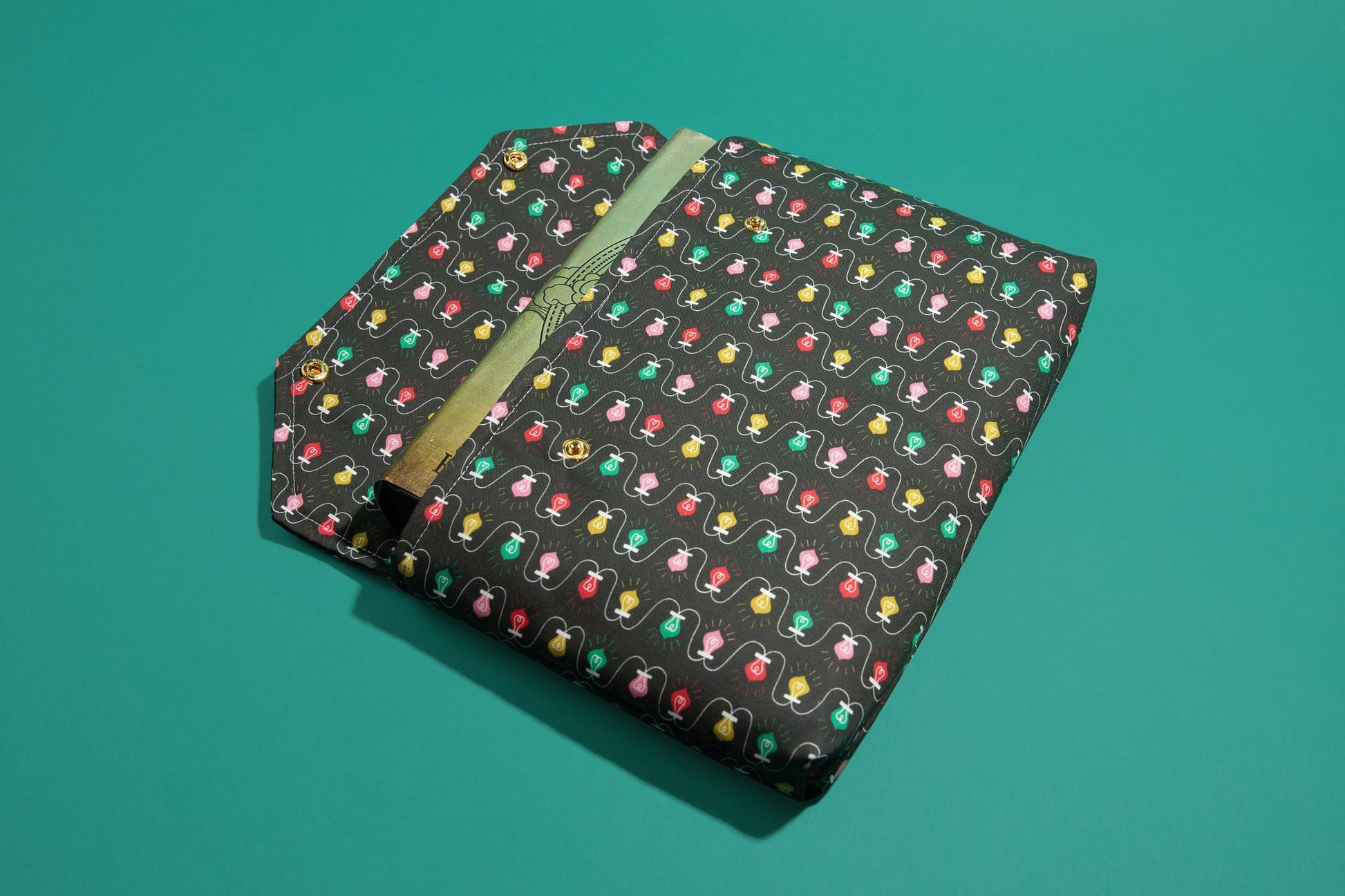 Protective envelope booksleeve with snap closure Full coverage book sleeve with padding Protective kindle case for winter holiday lights