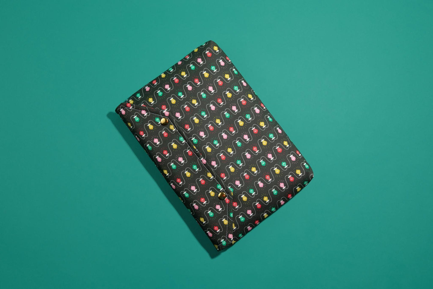 Protective envelope booksleeve with snap closure Full coverage book sleeve with padding Protective kindle case for winter holiday lights