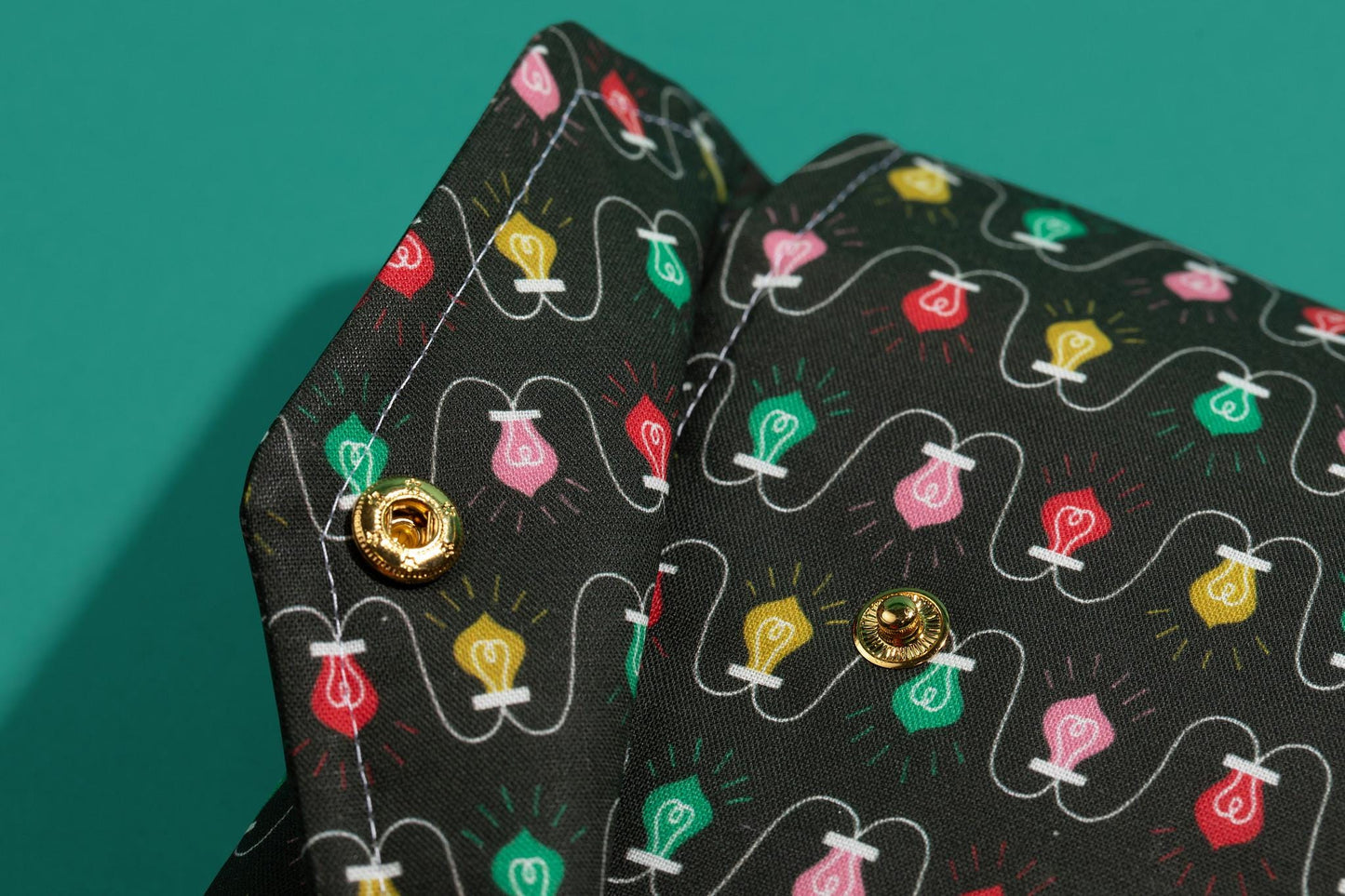 Protective envelope booksleeve with snap closure Full coverage book sleeve with padding Protective kindle case for winter holiday lights