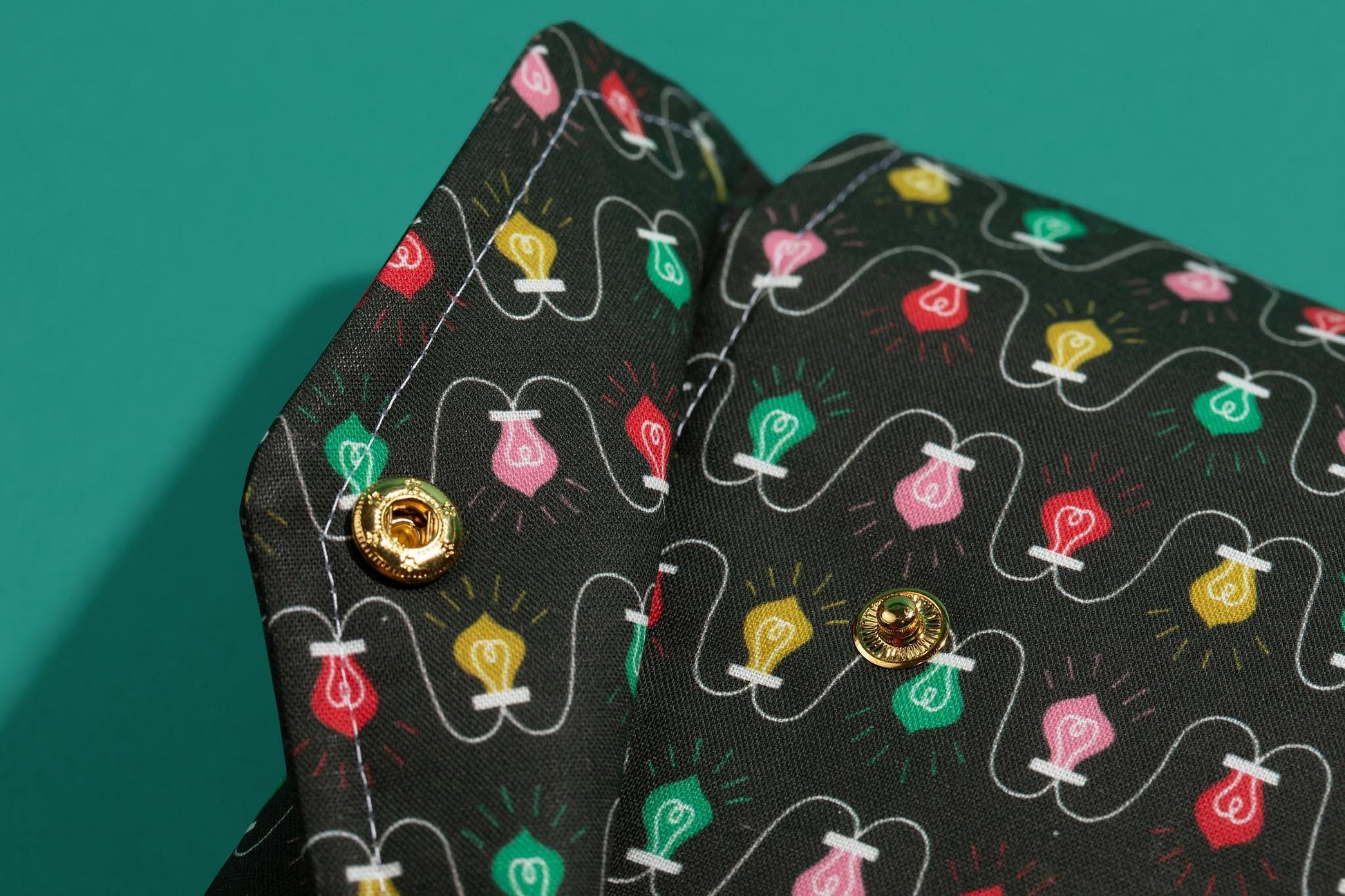 Protective envelope booksleeve with snap closure Full coverage book sleeve with padding Protective kindle case for winter holiday lights