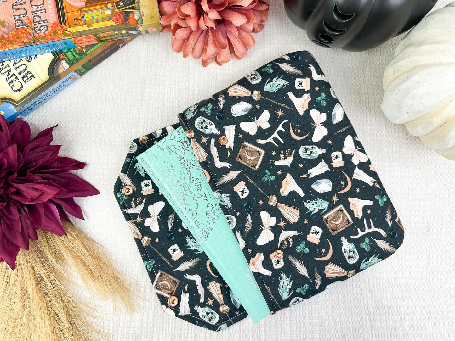 Spell Caster Fall Halloween padded protective book sleeve with secure snap closure for paperbacks hardcovers and e-readers like kindle