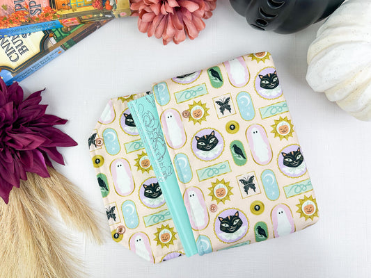 Framed Fright Fall Halloween padded protective book sleeve with secure snap closure for paperbacks hardcovers and e-readers like kindle