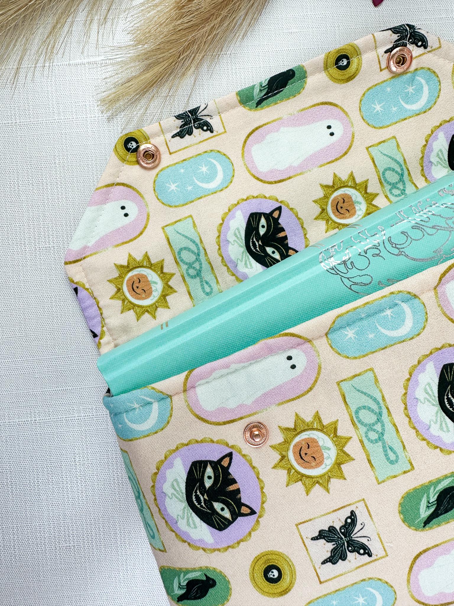 Framed Fright Fall Halloween padded protective book sleeve with secure snap closure for paperbacks hardcovers and e-readers like kindle